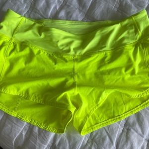 Lululemon 2.5” speed up shorts (neon yellow, size 8)